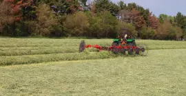 SR 100 GII wheel rake at work
