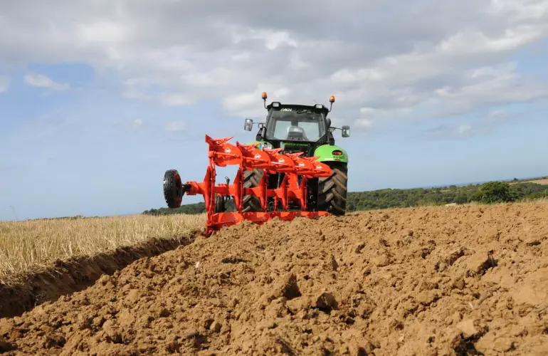 Mounted Plough Master 103 working in a field