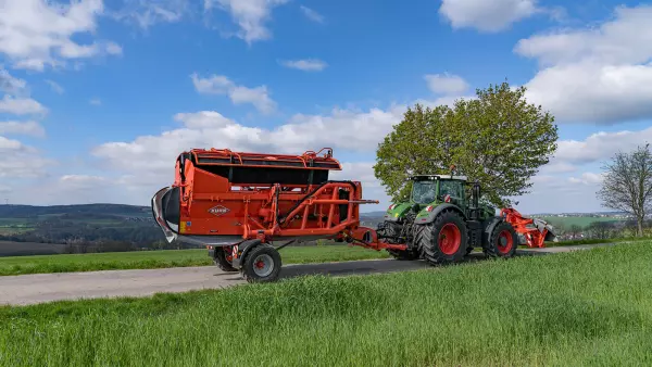 The FC 13460 RA mower conditioner travelling on a road.