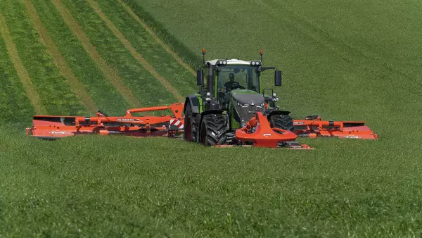 The FC 13460 RA mower conditioner at work on grassland.