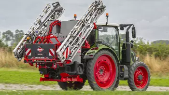 Photo of a DELTIS 2 mounted sprayer on the road