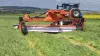 KUHN GMD 5251 TC large-width trailed disc mower on the road