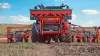 Air Precision Seed Drill MAXIMA 3 at work with a front hopper