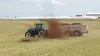 KUHN SLC 141 manure spreader in action
