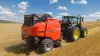 VB 7190 baling round bales of straw under a nice blue sky